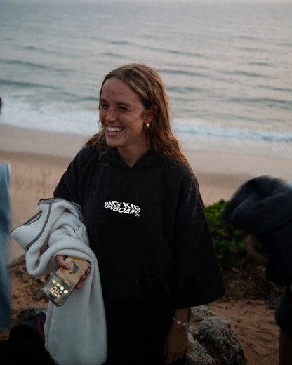 Poncho de surf negro