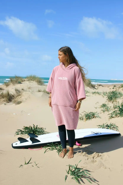 Poncho de surf rosa