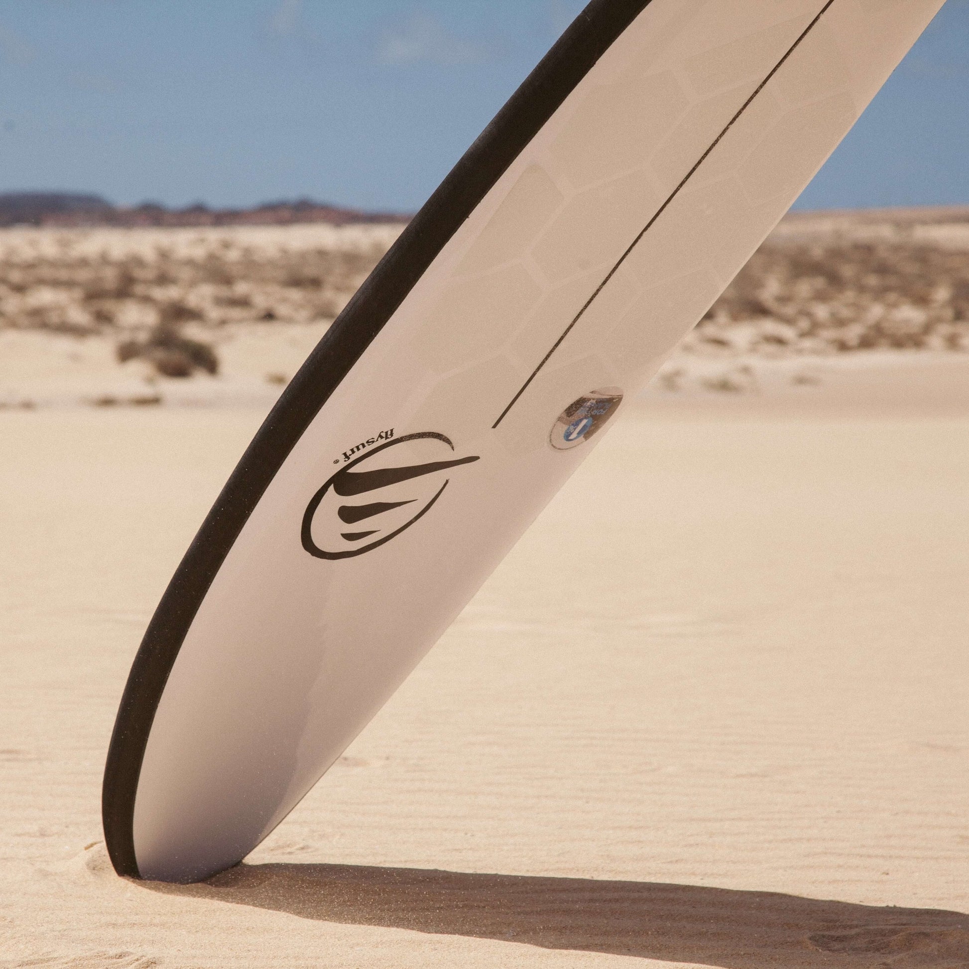 Deck tabla de surf Flysurf en la playa